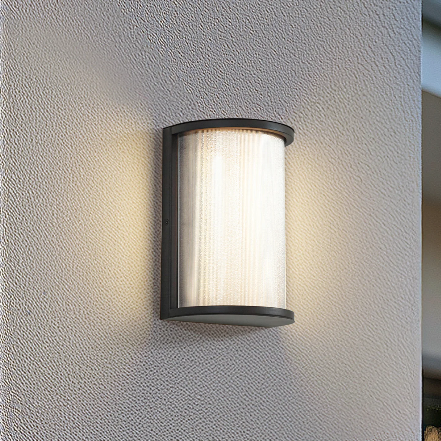 Calvik LED-Außenwandleuchte, IP44, schwarz, 24 cm, geriffelt - Lindby - Balkon - Modern - Metall - Einflammig