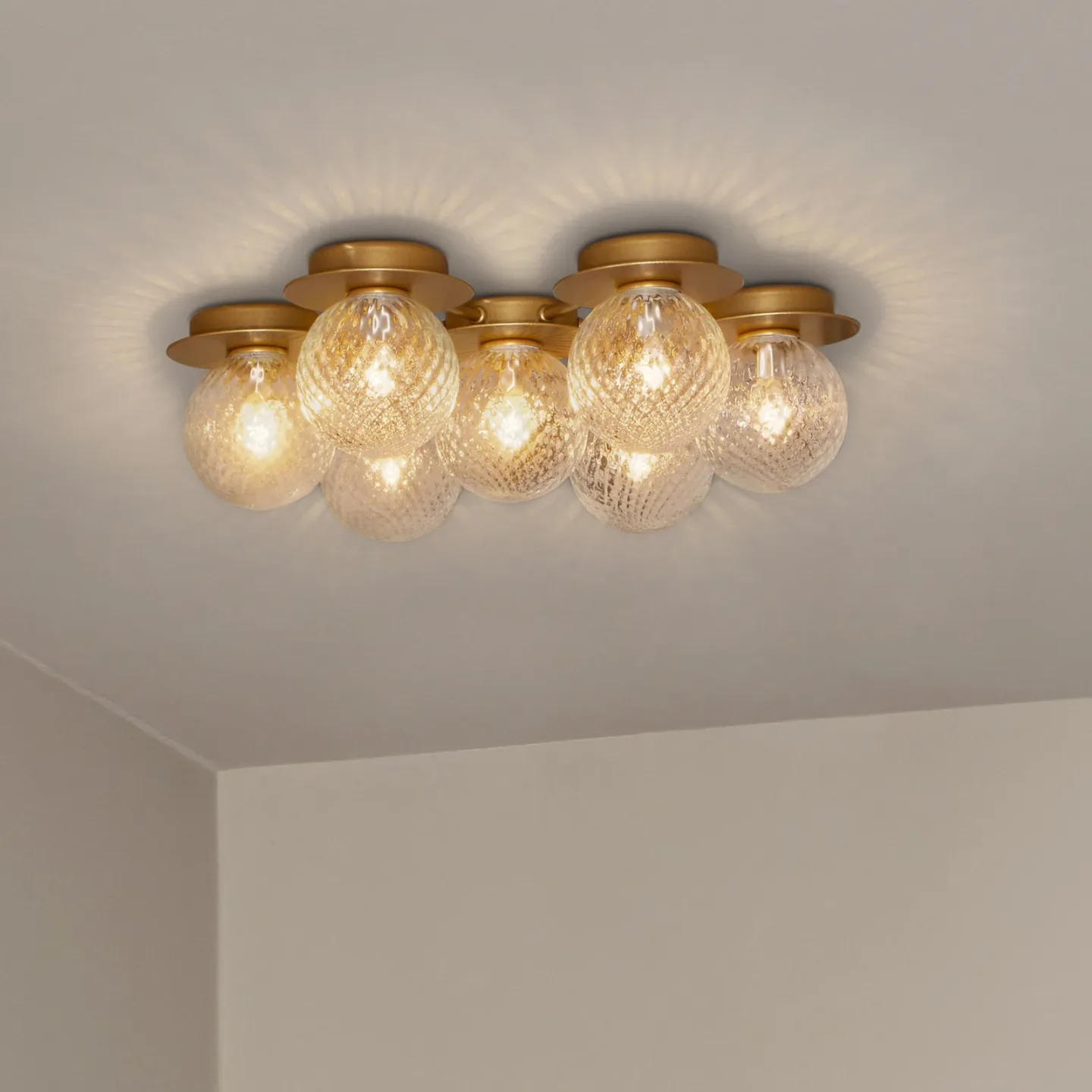 Liila Star væglampe, 7 lyskilder, guld/klar, varmhvid - Nuura Nuura Aps - Stue - Design - Glas - Kugle
