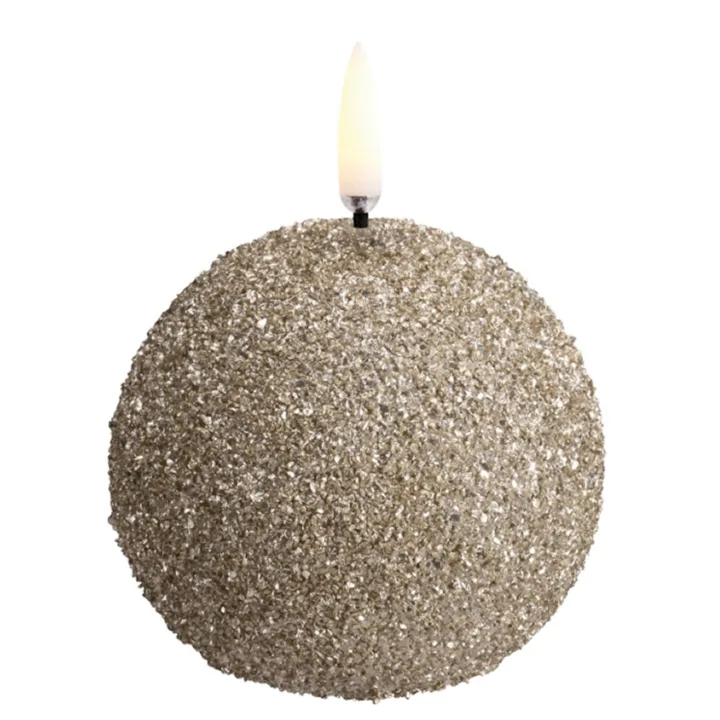 ROUND LED-stearinlys, kremfarget, Ø 7 cm, glitter - Uyuni Lighting - Stue - Annet - Med en lyskilde