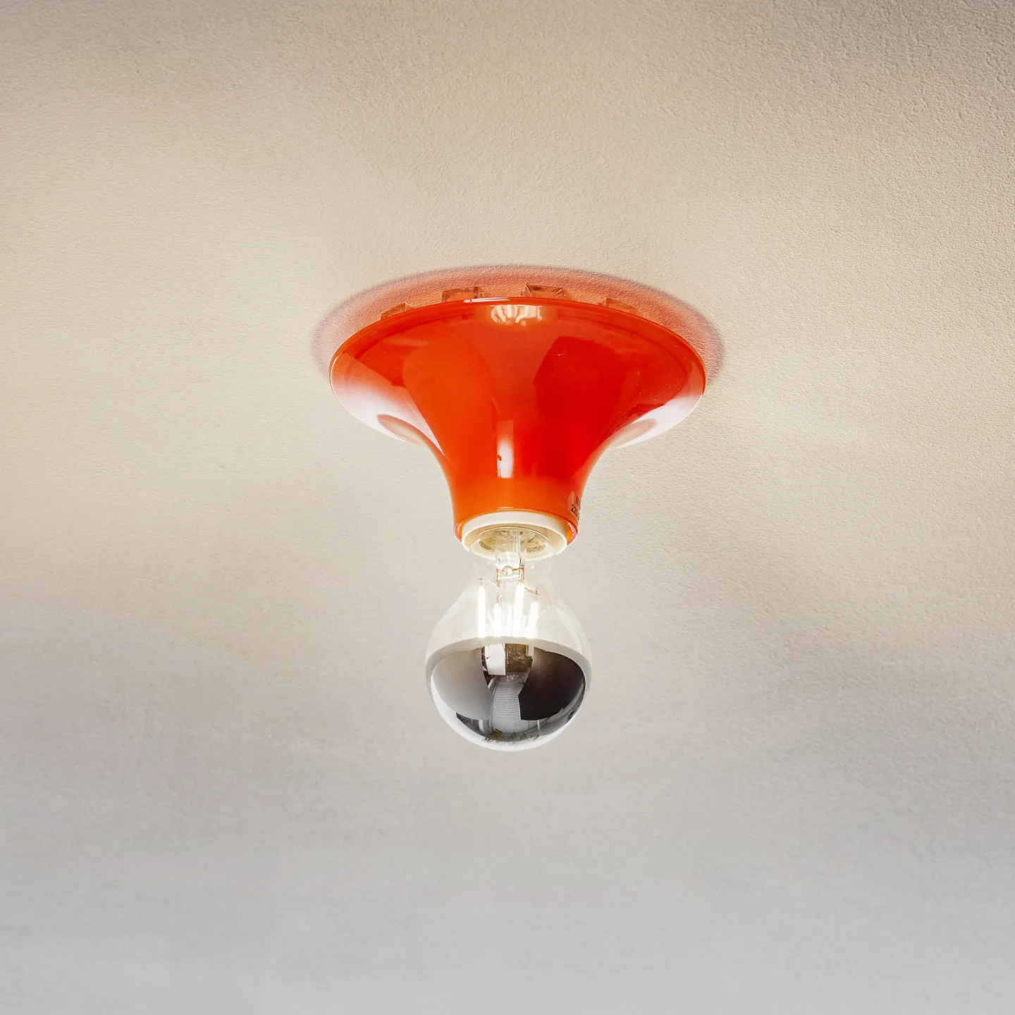 Artemide Teti vägglampa Transparent orange