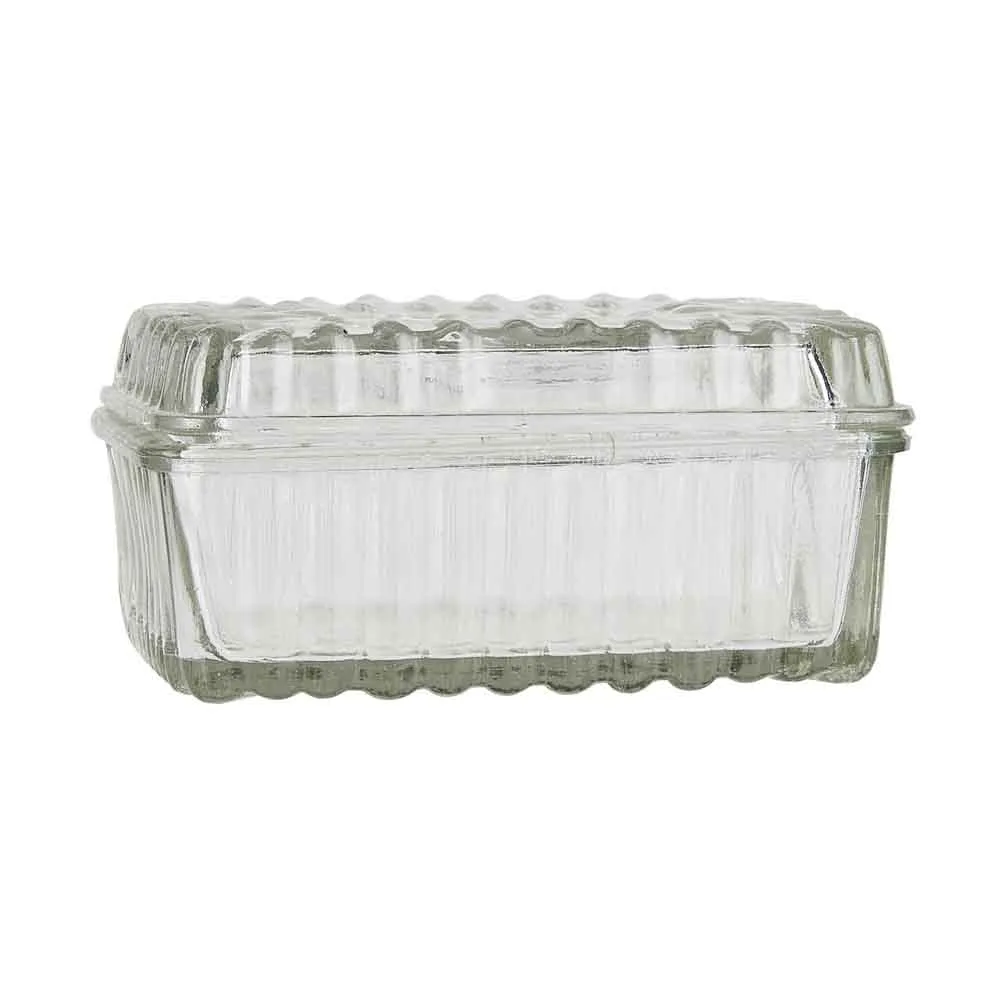 Liten smörlåda i mönstrat glas