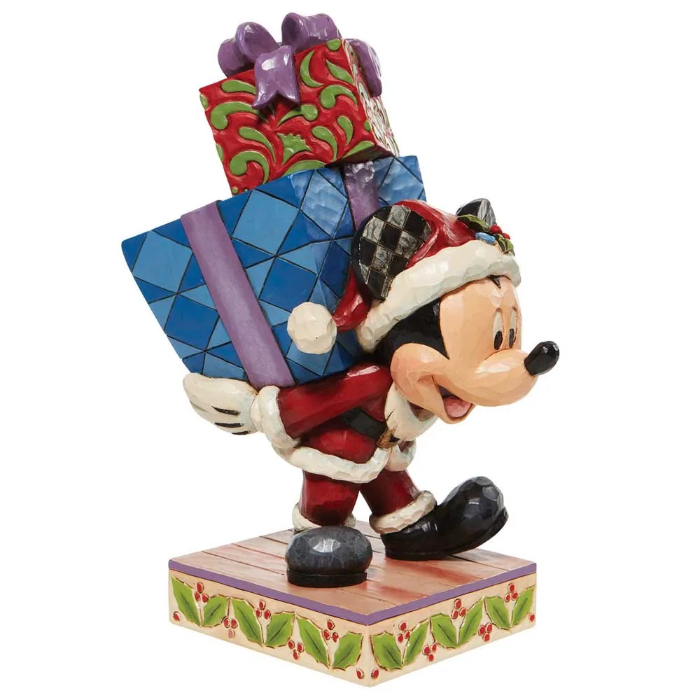 Disney Figur Musse bär på Julklappar