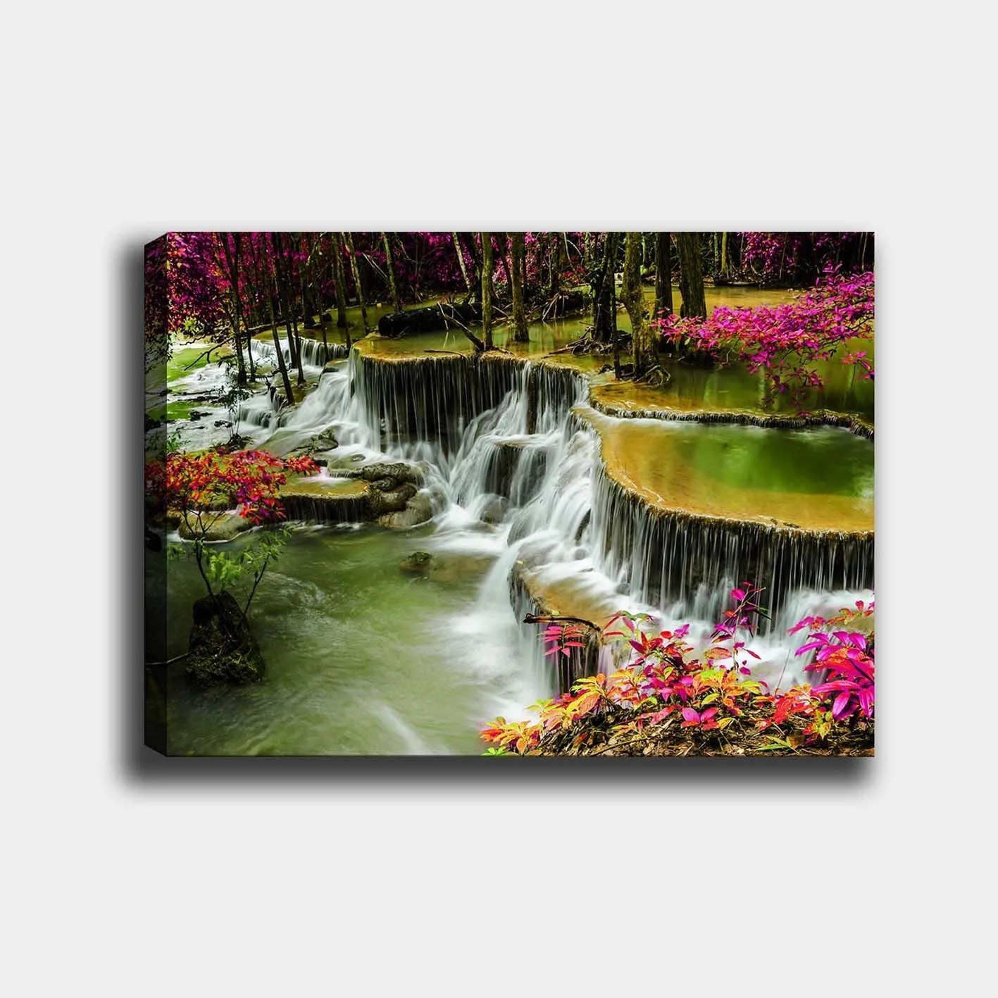 Canvastavla 70x100 cm - Vacker vattenfallsscen omgiven av färgglada blommor och grönskande träd - Grön / Rosa / Brun